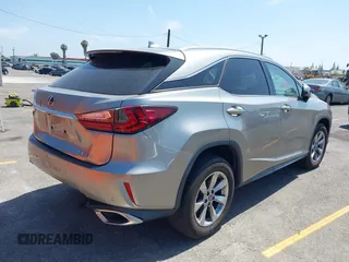2018 Lexus RX 350 with VIN 2T2ZZMCA4JC115390, listed as a IAAI auction lot 42515866 with 51,760 mi miles and . Bid and sale history available at DreamBid. Image 4.