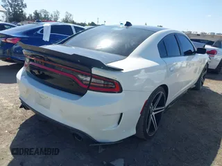 2019 Dodge Charger R/T with VIN 2C3CDXCT4KH681945, listed as a IAAI auction lot 41922885 with 73,769 mi miles and . Bid and sale history available at carsss.com. Image 4.