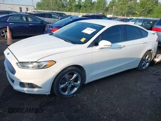 2013 Ford Fusion SE with VIN 3FA6P0HR7DR219834, listed as a IAAI auction lot 42742690 with 176,359 mi miles and . Bid and sale history available at DreamBid. Image 2.