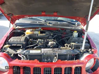 2005 Jeep Liberty Sport with VIN 1J4GL48K95W662399, listed as a IAAI auction lot 41900952 with 127,230 mi miles. Bid and sale history available at carsss.com. Image 10.