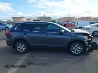 2014 Mazda CX-9 Sport with VIN JM3TB3BAXE0442006, listed as a IAAI auction lot 41430742 with 82,682 mi miles and . Bid and sale history available at DreamBid. Image 13.