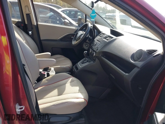 2012 Mazda 5 Grand Touring with VIN JM1CW2DL3C0144402, listed as a IAAI auction lot 41923524 with 150,584 mi miles and . Bid and sale history available at DreamBid. Image 5.