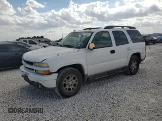 2005 Chevrolet Tahoe Z71 z VIN 1GNEC13T15R183413, wystawiony jako Copart lot #77471924 z przebiegiem 217 559 mil mil oraz Szkoda całkowita • Salvage title. Historia ofert i sprzedaży dostępna na DreamBid. Obrazek 1.