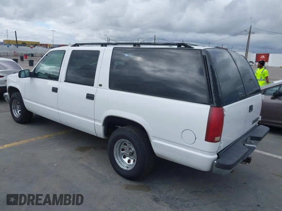 1999 Chevrolet Suburban with VIN 3GNEC16R2XG247140, listed as a IAAI auction lot 41761237 with 202,121 mi miles. Bid and sale history available at carsss.com. Image 3.