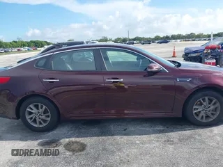 2020 Kia Optima LX with VIN 5XXGT4L37LG388611, listed as a IAAI auction lot 42741064 with 104,409 mi miles and . Bid and sale history available at DreamBid. Image 13.