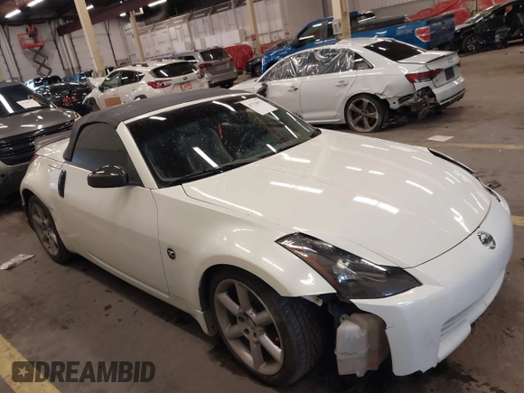 2005 Nissan 350Z Touring with VIN JN1AZ36A45M754923, listed as a IAAI auction lot 41720671 with 124,916 mi miles. Bid and sale history available at carsss.com. Image 13.