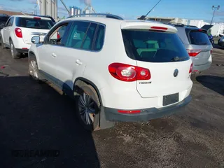 2011 Volkswagen Tiguan SE with VIN WVGBV7AX8BW536365, listed as a IAAI auction lot 41854029 with 126,916 mi miles and . Bid and sale history available at DreamBid. Image 3.