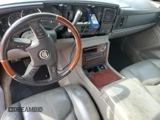 2006 Cadillac Escalade z VIN 1GYEK63N76R136618, wystawiony jako Copart lot #58990945 z przebiegiem Nie podano mil oraz Czysty tytuł • Clean title. Historia ofert i sprzedaży dostępna na DreamBid. Obrazek 8.