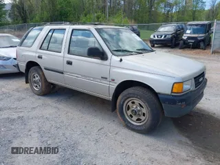 1996 Isuzu Rodeo z VIN 4S2CM58V8T4342957, wystawiony jako IAAI lot #42042265 z przebiegiem 250 506 mil mil oraz . Historia ofert i sprzedaży dostępna na DreamBid. Obrazek 1.