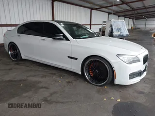 2014 BMW 7 Series ALPINA B7 with VIN WBAYE8C58ED135377, listed as a IAAI auction lot 41203095 with 87,082 mi miles. Bid and sale history available at carsss.com. Image 1.