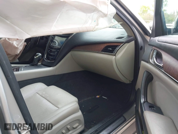 2016 Cadillac CTS Luxury Collection RWD z VIN 1G6AR5SXXG0128843, wystawiony jako IAAI lot #41404946 z przebiegiem 80 234 mil mil oraz . Historia ofert i sprzedaży dostępna na DreamBid. Obrazek 5.