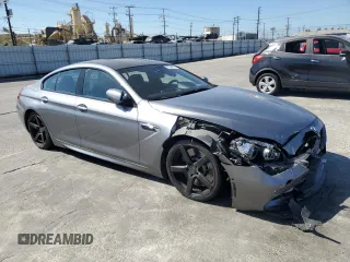 2015 BMW M6 z VIN WBS6C9C56FD467608, wystawiony jako Copart lot #67796074 z przebiegiem 67 706 mil mil oraz Szkoda całkowita • Salvage title. Historia ofert i sprzedaży dostępna na DreamBid. Obrazek 4.