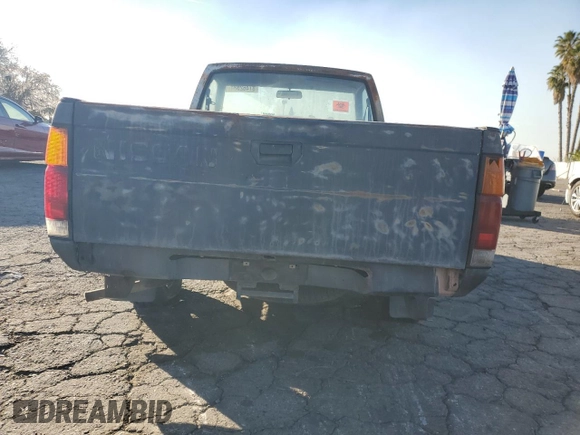 1991 Nissan Frontier z VIN 1N6SD11S2MC350332, wystawiony jako Copart lot #87462534 z przebiegiem 350 692 mil mil oraz Szkoda całkowita • Salvage title. Historia ofert i sprzedaży dostępna na DreamBid. Obrazek 6.
