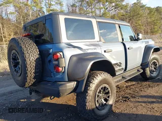 2023 Ford Bronco Raptor with VIN 1FMEE5JR6PLB23226, listed as a IAAI auction lot 41540365 with 14,619 mi miles. Bid and sale history available at carsss.com. Image 4.