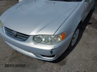 2002 Toyota Corolla CE with VIN 1NXBR12E12Z581660, listed as a IAAI auction lot 42654124 with 115,950 mi miles and . Bid and sale history available at DreamBid. Image 6.