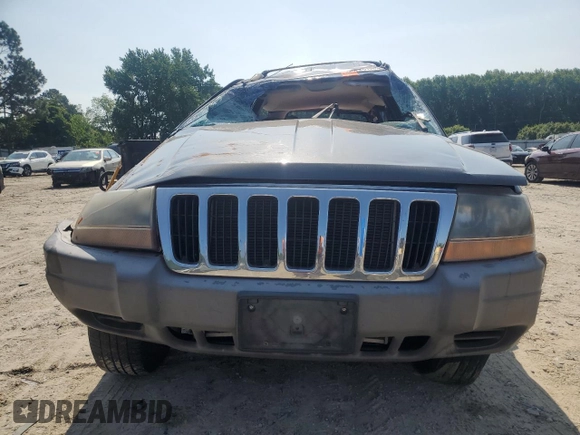 1999 Jeep Grand Cherokee Laredo с VIN 1J4G258S9XC758711, выставлен на аукционе Copart как лот 58420835 с пробегом Не указан миль и Списание • Salvage title. История ставок и продаж доступна на DreamBid. Изображение 5.