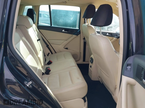 2012 Volkswagen Tiguan SE with VIN WVGAV7AX3CW531264, listed as a IAAI auction lot 41651242 with 190,669 mi miles and . Bid and sale history available at DreamBid. Image 8.