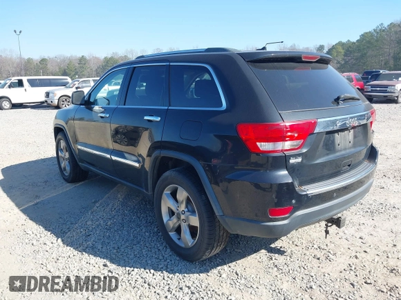 2013 Jeep Grand Cherokee Overland with VIN 1C4RJECG7DC644822, listed as a IAAI auction lot 41658872 with 156,838 mi miles. Bid and sale history available at carsss.com. Image 3.