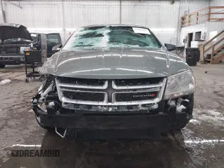 2013 Dodge Avenger SE with VIN 1C3CDZAB1DN581303, listed as a IAAI auction lot 41942469 with 123,330 mi miles. Bid and sale history available at carsss.com. Image 13.