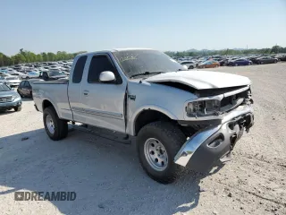 2000 Ford F-150 XL with VIN 1FTRX18L8YNB58706, listed as a Copart auction lot 53243215 with 0 mi miles and Salvage Title. Bid and sale history available at carsss.com. Image 4.
