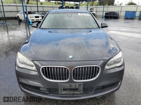 2015 BMW 7 Series 740Li with VIN WBAYE4C52FD947509, listed as a Copart auction lot 49269705 with 80,111 mi miles and Salvage Title. Bid and sale history available at DreamBid. Image 5.