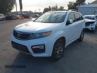 2012 Kia Sorento SX with VIN 5XYKW4A29CG224803, listed as a IAAI auction lot 41493527 with 228,065 mi miles. Bid and sale history available at carsss.com. Image 2.