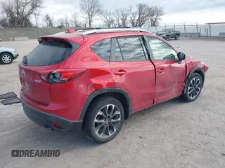 2016 Mazda CX-5 Grand Touring with VIN JM3KE4DY8G0729446, listed as a IAAI auction lot 41871207 with 89,258 mi miles. Bid and sale history available at carsss.com. Image 4.