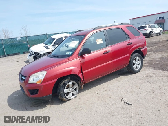 2010 Kia Sportage LX with VIN KNDKGCA39A7709095, listed as a IAAI auction lot 42017606 with 108,774 mi miles and . Bid and sale history available at carsss.com. Image 2.