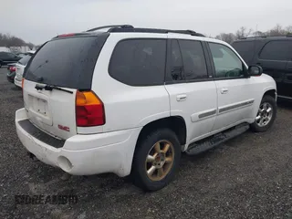 2003 GMC Envoy SLE with VIN 1GKDT13S732332171, listed as a IAAI auction lot 41520620 with 222,373 mi miles. Bid and sale history available at carsss.com. Image 4.