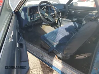 1987 Chevrolet El Camino z VIN 3GCCW80Z9HS905561, wystawiony jako Copart lot #75401604 z przebiegiem 32 958 mil mil oraz Szkody całkowita. Historia ofert i sprzedaży dostępna na DreamBid. Obrazek 8.