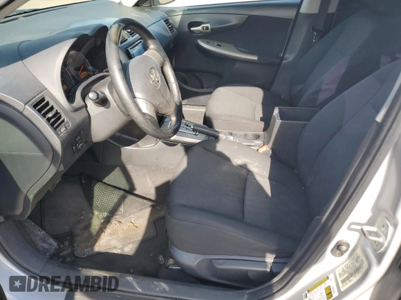 2010 Toyota Corolla with VIN 1NXBU4EE7AZ227815, listed as a Copart auction lot 61234235 with 167,828 mi miles and Salvage title. Bid and sale history available at DreamBid. Image 7.