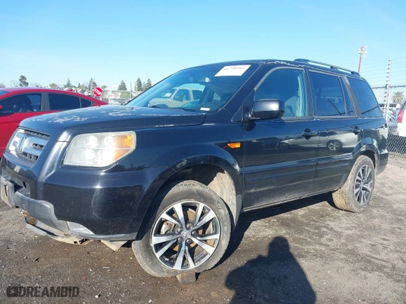 2006 Honda Pilot EX-L with VIN 5FNYF28586B037160, listed as a IAAI auction lot 41798991 with 207,486 mi miles. Bid and sale history available at carsss.com. Image 14.