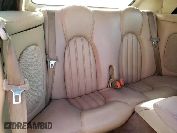 1999 Jaguar XK with VIN SAJGX2043XC040866, listed as a Copart auction lot 53712555 with 65,349 mi miles and Clean Title. Bid and sale history available at DreamBid. Image 10.