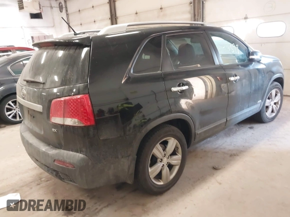 2013 Kia Sorento EX with VIN 5XYKUDA63DG410184, listed as a IAAI auction lot 41416399 with 214,623 mi miles. Bid and sale history available at carsss.com. Image 4.