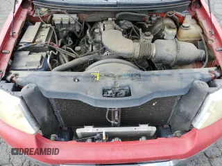 2004 Ford F-150 STX with VIN 1FTRX02W44KB96118, listed as a Copart auction lot 71984374 with 146,820 mi miles and Salvage title. Bid and sale history available at DreamBid. Image 11.