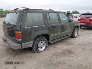 1996 Ford Explorer XL with VIN 1FMDU34X7TZB67613, listed as a IAAI auction lot 42513644 with 169,502 mi miles and . Bid and sale history available at DreamBid. Image 4.