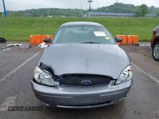 2006 Ford Taurus SE z VIN 1FAFP53U56A253230, wystawiony jako IAAI lot #42247009 z przebiegiem 85 913 mil mil oraz . Historia ofert i sprzedaży dostępna na DreamBid. Obrazek 12.