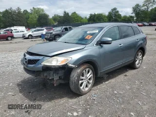 2011 Mazda CX-9 Grand Touring с VIN JM3TB2DA2B0311879, выставлен на аукционе Copart как лот 56294315 с пробегом 231 716 миль миль и Чистый • Clean title. История ставок и продаж доступна на DreamBid. Изображение 1.