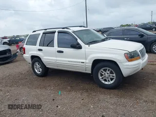 2004 Jeep Grand Cherokee Laredo with VIN 1J4GW48S94C136376, listed as a IAAI auction lot 42094499 with 90,950 mi miles and . Bid and sale history available at DreamBid. Image 1.