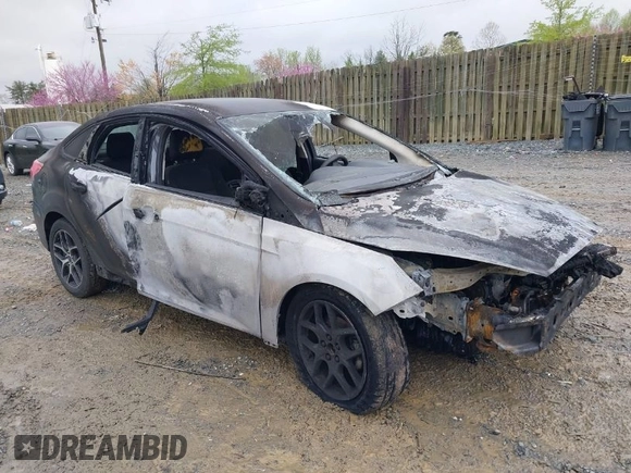 2018 Ford Focus SE with VIN 1FADP3FE8JL256720, listed as a IAAI auction lot 41972795 with 1 mi miles. Bid and sale history available at carsss.com. Image 1.