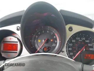 2009 Nissan 370Z Touring with VIN JN1AZ44E99M411252, listed as a IAAI auction lot 41969671 with 91,873 mi miles and . Bid and sale history available at DreamBid. Image 7.