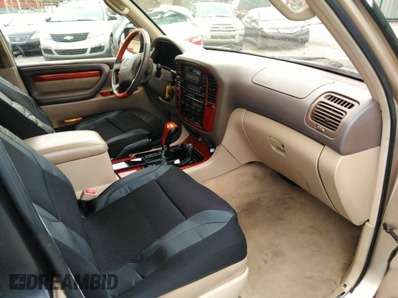 2000 Lexus LX 470 with VIN JT6HT00W8Y0100087, listed as a IAAI auction lot 41762294 with 274,720 mi miles and . Bid and sale history available at carsss.com. Image 5.