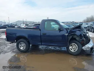 2003 Ford F-150 Heritage XL with VIN 2FTRF172X3CA60139, listed as a IAAI auction lot 41608378 with 81,965 mi miles. Bid and sale history available at carsss.com. Image 13.