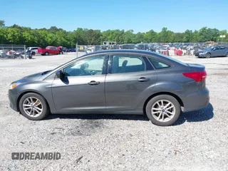 2018 Ford Focus SE z VIN 1FADP3FE1JL238012, wystawiony jako IAAI lot #42185232 z przebiegiem 143 687 mil mil oraz . Historia ofert i sprzedaży dostępna na DreamBid. Obrazek 14.