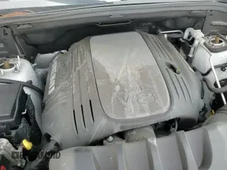 2019 Jeep Grand Cherokee Overland z VIN 1C4RJFCT1KC526877, wystawiony jako Copart lot #54940355 z przebiegiem 49 226 mil mil oraz Szkoda całkowita • Salvage title. Historia ofert i sprzedaży dostępna na DreamBid. Obrazek 14.