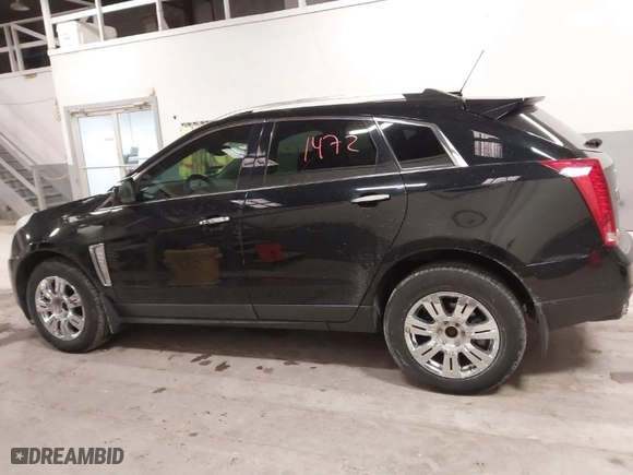 2015 Cadillac SRX Luxury Collection with VIN 3GYFNEE38FS628508, listed as a IAAI auction lot 41411472 with 120,123 mi miles. Bid and sale history available at carsss.com. Image 14.