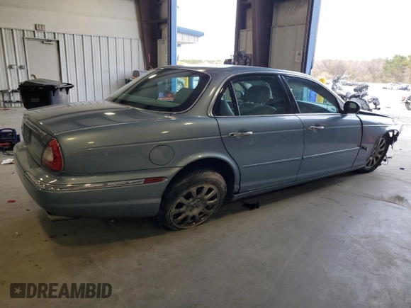 2004 Jaguar XJ with VIN SAJWA71C34SG29145, listed as a Copart auction lot 45932635 with 133,888 mi miles and Salvage Title. Bid and sale history available at carsss.com. Image 3.