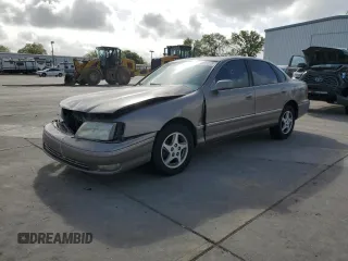 1998 Toyota Avalon XL with VIN 4T1BF18B1WU255028, listed as a Copart auction lot 51017075 with 248,911 mi miles and Salvage Title. Bid and sale history available at DreamBid. Image 1.