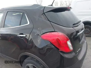 2013 Buick Encore Leather with VIN KL4CJCSB0DB144646, listed as a IAAI auction lot 41668384 with 122,082 mi miles and . Bid and sale history available at carsss.com. Image 6.