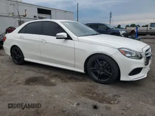 2014 Mercedes-Benz E 350 Sport with VIN WDDHF5KB9EA831131, listed as a Copart auction lot 55201435 with 121,696 mi miles and Clean Title. Bid and sale history available at DreamBid. Image 4.